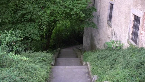 Walk from the old stairs to the park Stock Footage