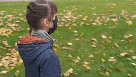 Walk in the park with a mask. Stock Footage 143918755