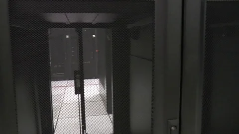 Walk past empty racks to a server Stock Footage 84284802