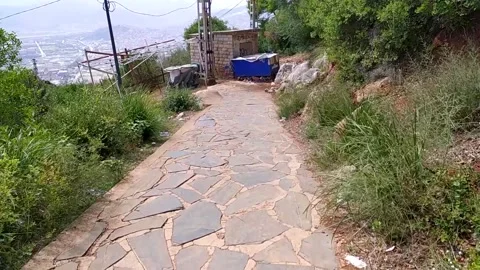 Walk shot in a mountain path Stock Footage 266281164