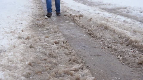 Walk on a slippery road in winter Stock Footage 236480162