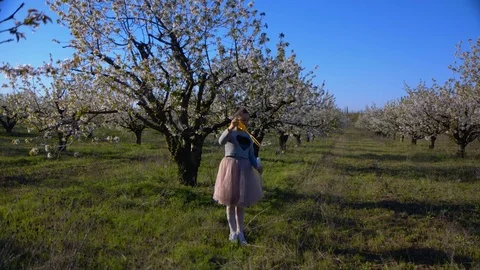 Walk in the spring garden of two sisters Stock Footage 102682274