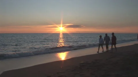Walk at sunset on the sea Stock Footage 3602790