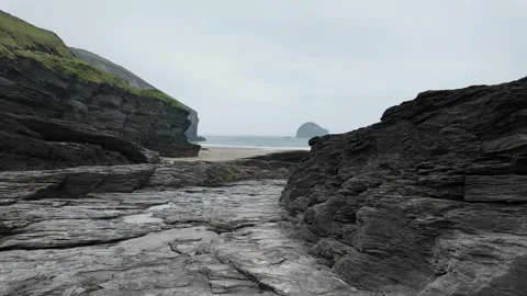 Walk through cliffs to beach Stock Footage 275081674