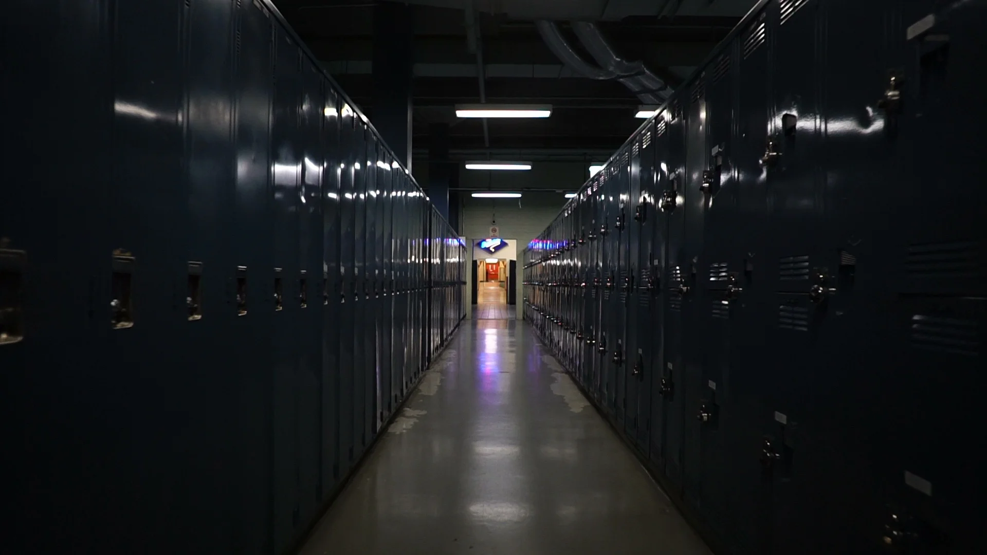 school hallway with students and lockers