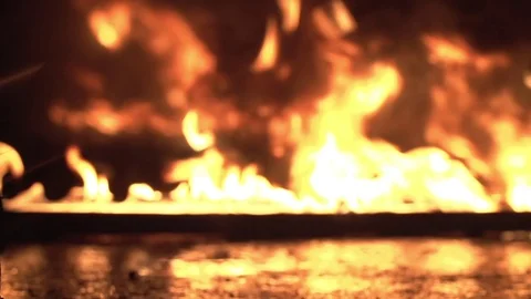 Walk Through Fire Stock Footage 76437133