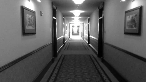 Walk Through Hotel Corridor in Black and White Stock Footage 89771808