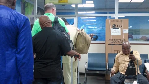 Walk through inside South Africa’s O.R. Tambo International Airport, from Stock Footage 323265850