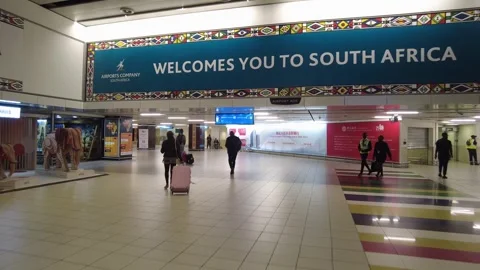 Walk through inside South Africa’s O.R. Tambo International Airport, from 스톡 동영상 323909989