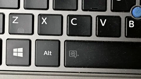 A walk through the keys of a portable computer Stock Footage 220648907