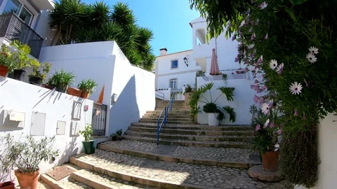 Walk through the narrow streets of the town, Algarve Stock Footage 106580955