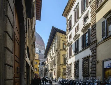 Walk through the old and narrow streets of Florence near the Cathedral of San Stock Photos