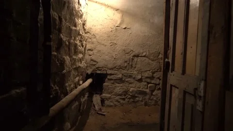 Walk through an old dark underground basement or a closet in an old house Stock Footage 152715072