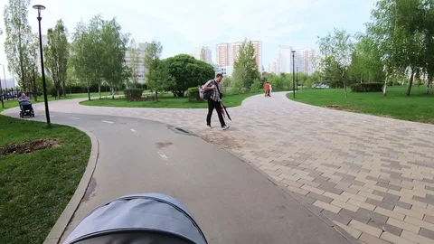 Walk through the park with a stroller Vídeos de archivo 108836416