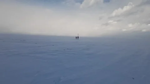 Walk through the snow field Stock Footage 272421479