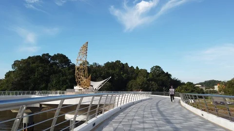 Walk through Sultan Omar 'Ali Saifuddien Pedestrian Bridge Stock-Footage 101150967