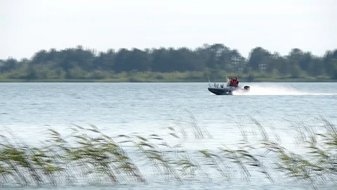 Walk through the water. Rescue operation. Fishing. Poachers Stock Footage 103486580