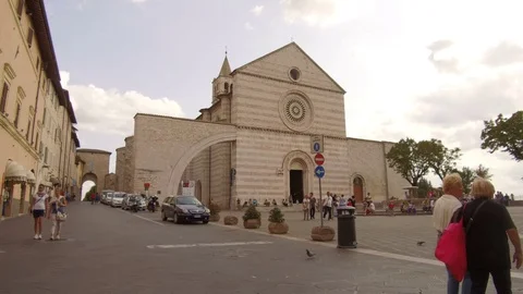 Walk towards the basilica in the center of Assisi Stock Footage 82133053