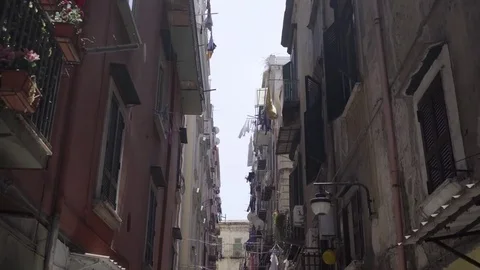 A walk in a typical street of Naples, between the old buildingse. Stock-Footage 83545900