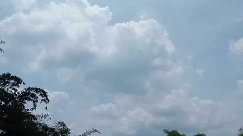 Walk in the village see white clouds Stock Footage 221296324