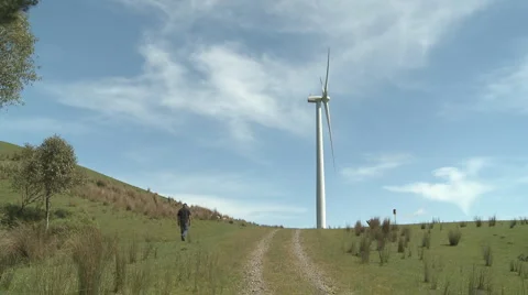 Walk up to wind turbine Stock Footage 952699