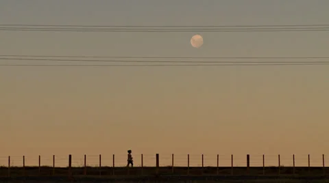 Walker and the moon Stock Footage 32173485