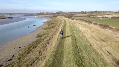 Walker Follow Drone Shot Stock Footage 140509587
