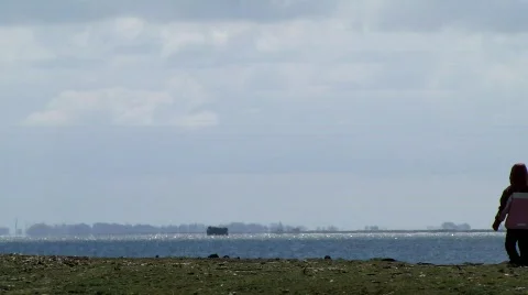 Walker at the sea Stock Footage 709362