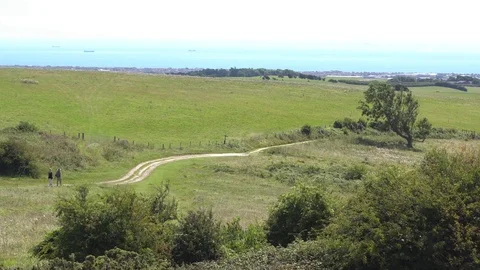 Walkers hiking in the South Downs. Video stock 78769068