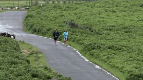 Walkers In The Valley Of The Rocks Stock Footage 65302605