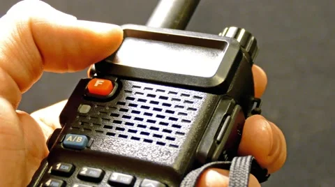 Walkie talkie in hand.  Stock Footage 45366681