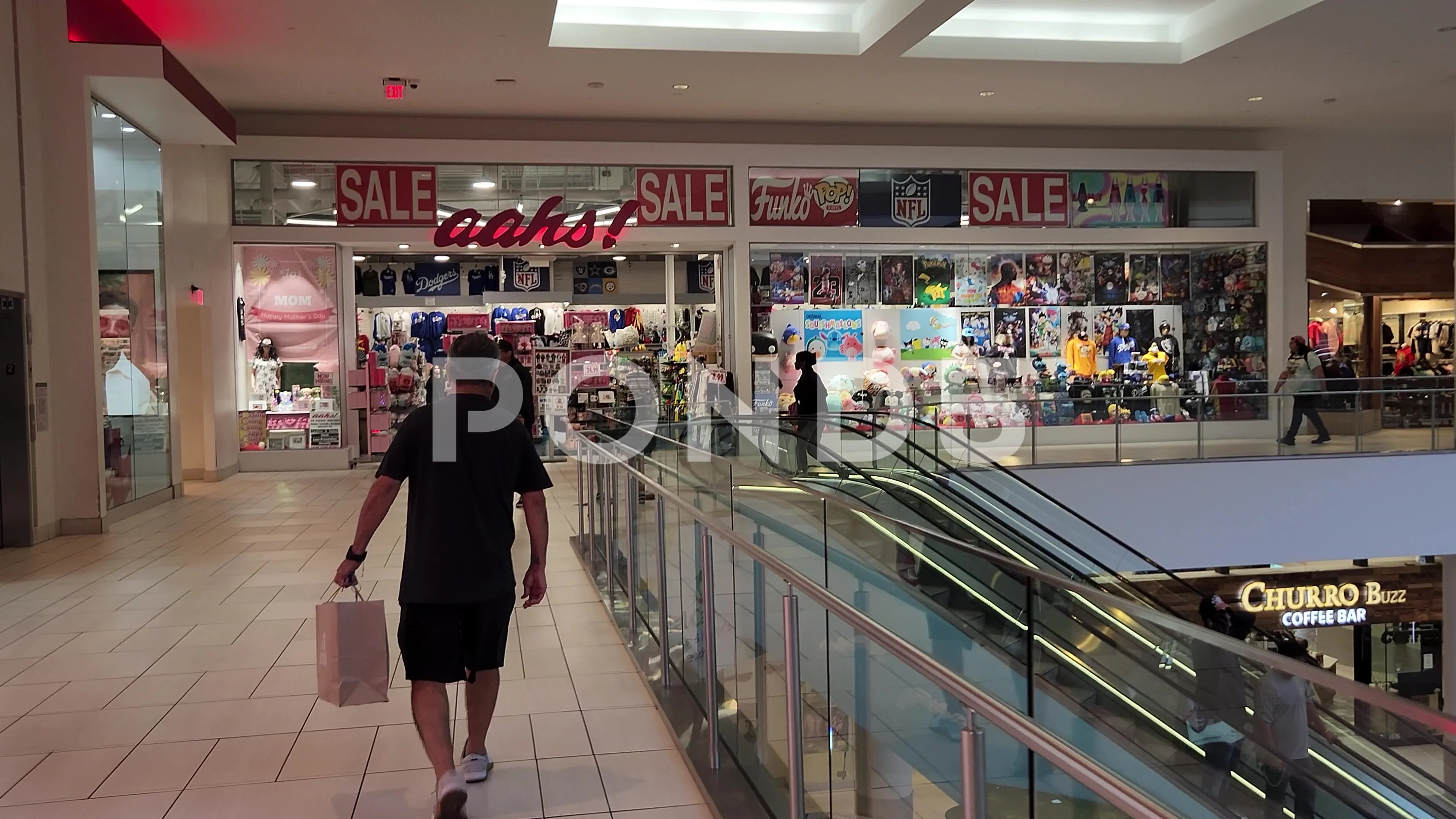 Walking aahst Simon Shopping Mall Retail, Stock Video