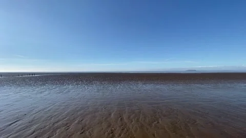 Walking across the beach Video stock 149685415