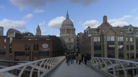 Walking Across Millennium Bridge Toward St. Paul's Cathedral in London Stock Footage 154107022