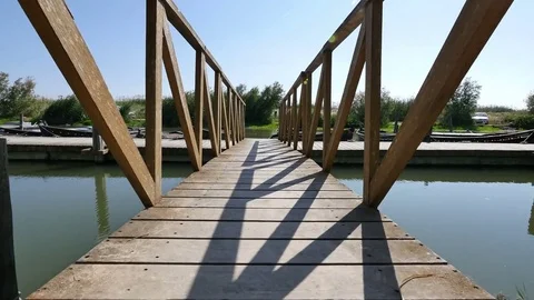Walking Across the Wooden Bridge till the Pier Stock Footage