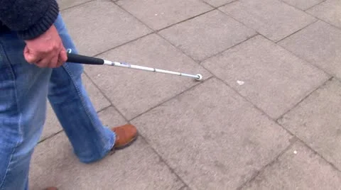 Walking with aid of a blind man. (Steady-Cam) Stock Footage 10892869