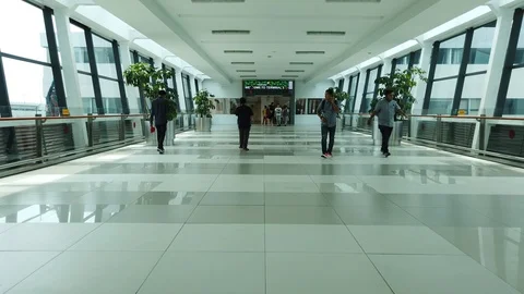 Walking in Airport's Corridor Stock Footage