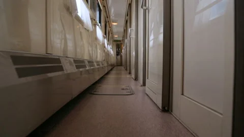 Walking along an aisle in a train Stock Footage 102844930