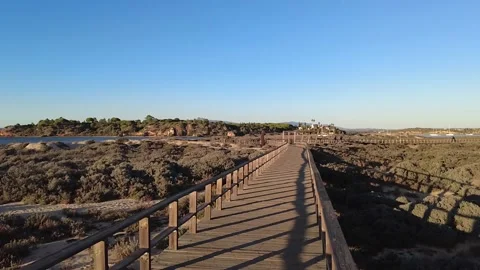 Walking along the Alvor Estuary trail, Algarve, Portugal Video stock 170594076