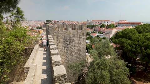 Walking Along Ancient Stone Ramparts Of Medieval Castle Stock Footage 327685632