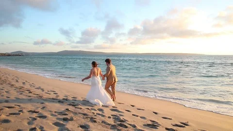 Walking Along The Beach At Sunset Stock-Footage 115327708
