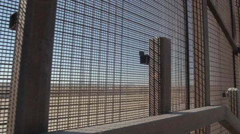 Walking Along the Border Fence on the US and Mexico Border 2 Stock Footage 60406397