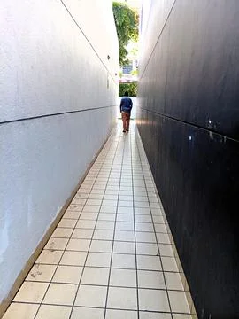 Walking along a corridor Stock Photos