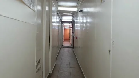 Walking along the corridor of a ship Stock Footage 138756742