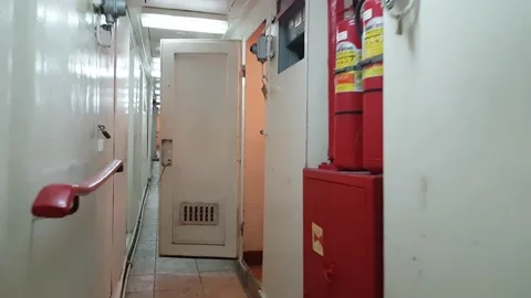 Walking along the deck and corridors of a large ship Stock Footage 138756842