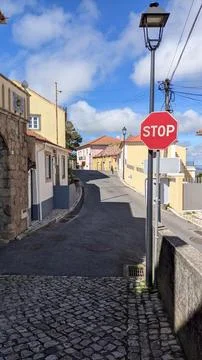 Walking along an empty street without people on a sunny day in the Sintra Stock Photos