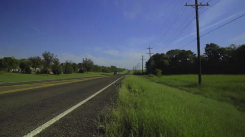 Walking along a highway in Texas Stock Footage 68503027