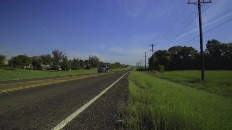 Walking along a highway in Texas Stock Footage 68503033