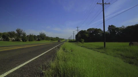 Walking along a highway in Texas Stock Footage 68503039