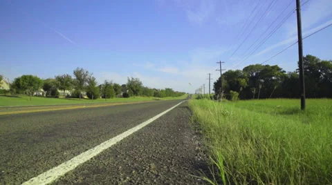 Walking along a highway in Texas Stock Footage 68503072